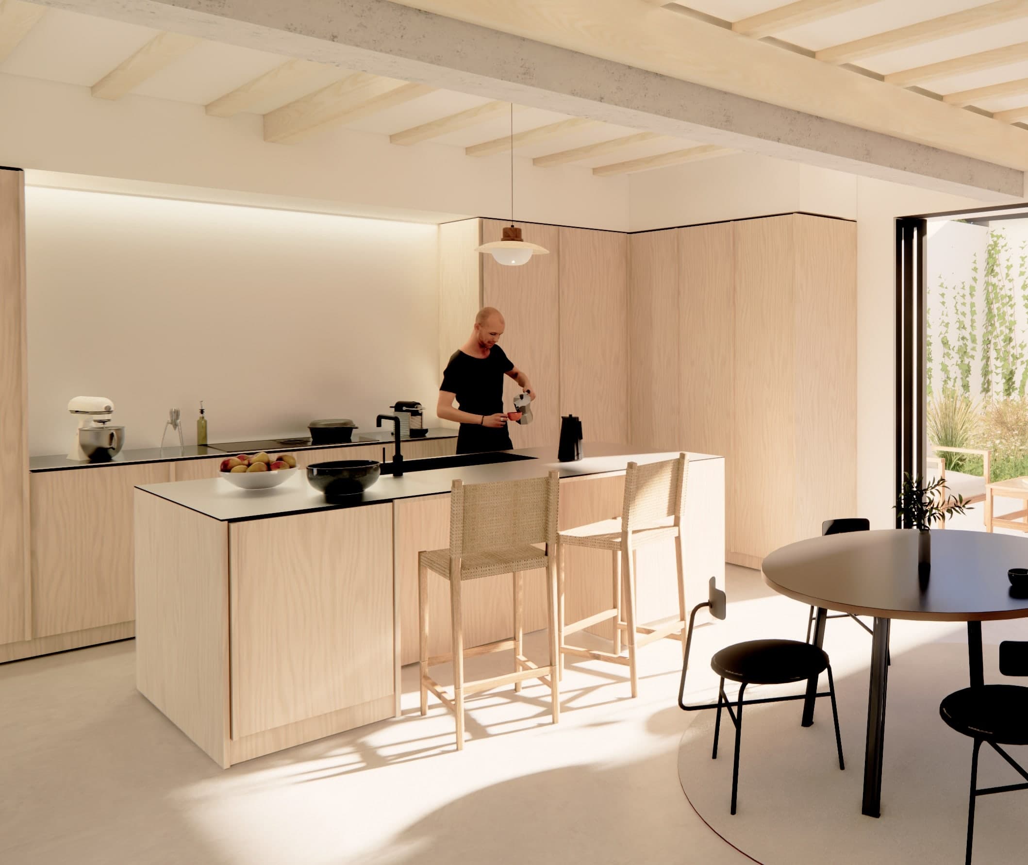 Loft N°01 — détail de la cuisine, îlot en bois clair.